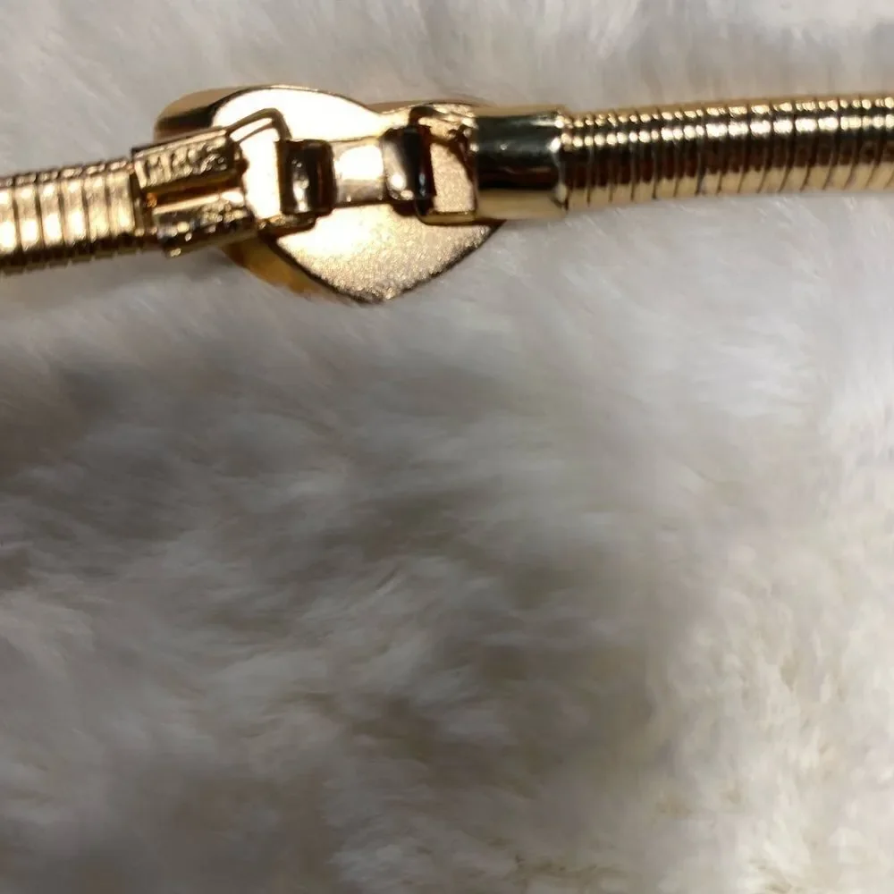 EUC vintage slinky gold tone heart buckle women's belt